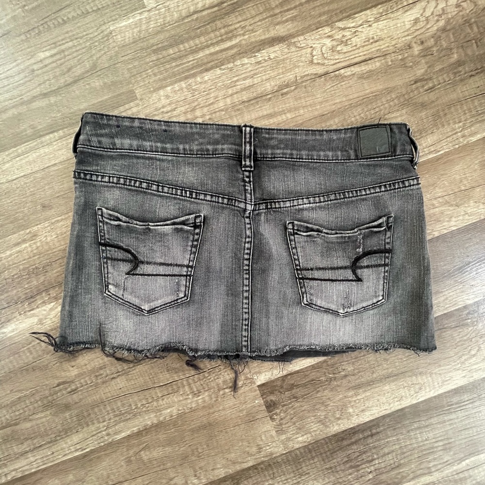 American Eagle black jean skirt with design pockets, size 4, stretch